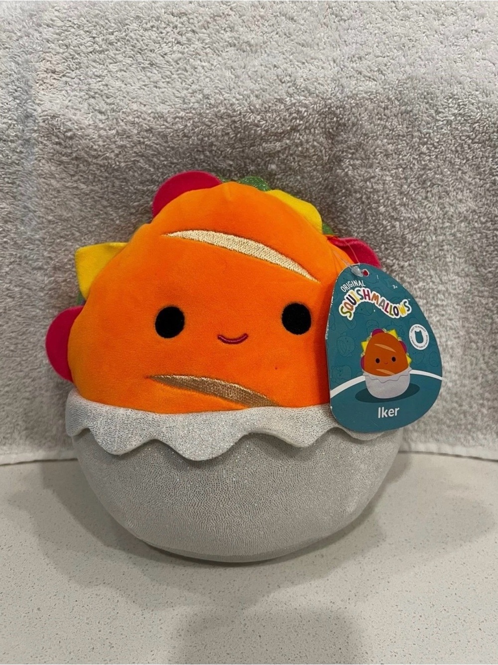 Squishmallows Iker Orange Plush with Colorful Spikes